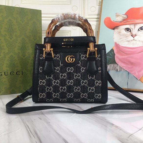 G*u*i top handle bags